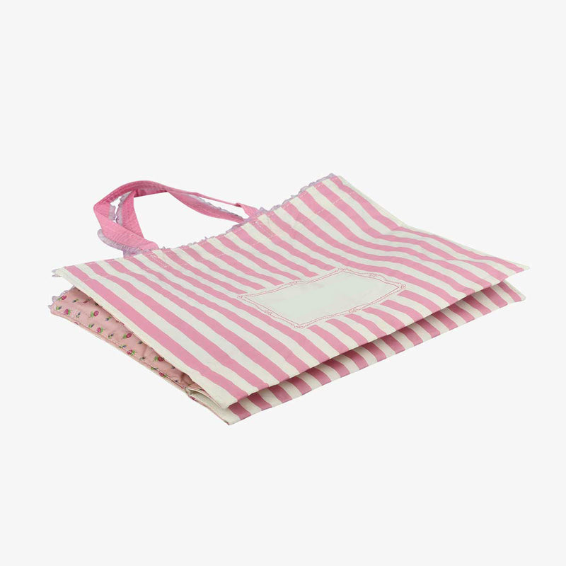 粉色柔和立體袋，攤平。