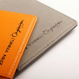陽光橘護照夾，PU進口仿皮紋、多功能名片夾/內袋、烙印LOGO上色。