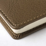 中性商務工商日誌，烙印，特寫