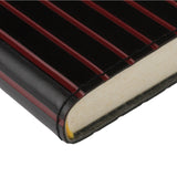 黑紅直條紋封套工商日誌，皮標烙印