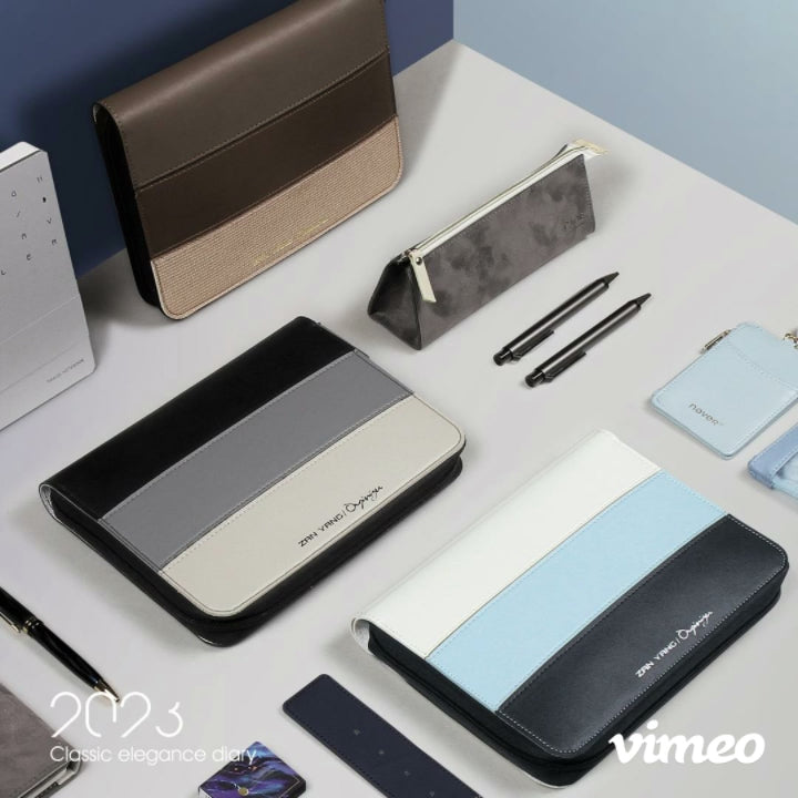 拼接色彩拉鍊包款工商日誌